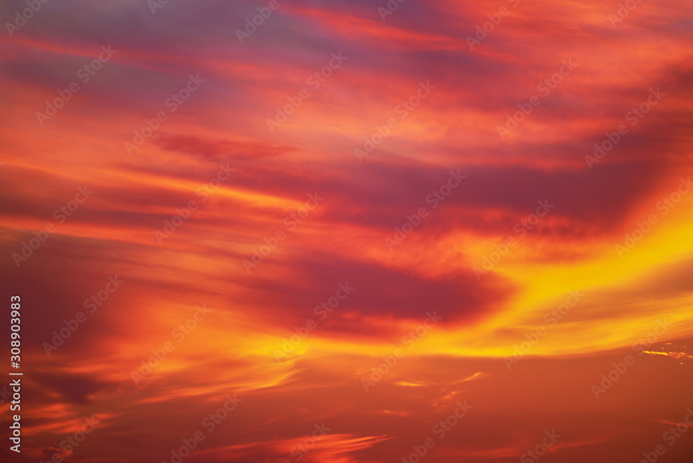 Fantastic colorful sunset. Vivid red and yellow colored clouds.