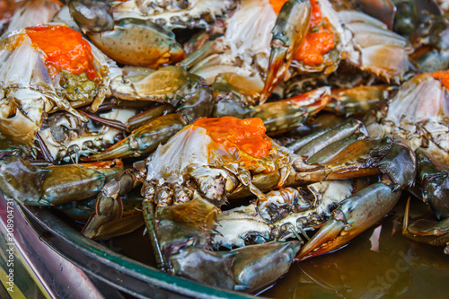 Crab in fish sauce at market street food.