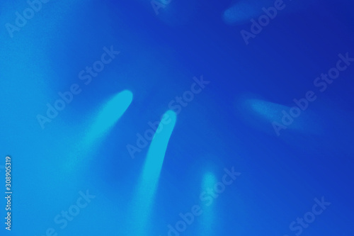 Bright Blue color tropical palm leaf shadow in trendy duotone neon background. © IrynaV