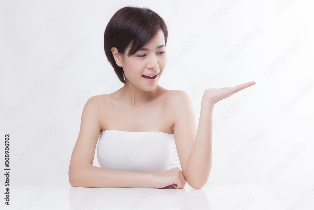Young beautiful Asian female model on the white background Young beautiful Asian female model on the white background