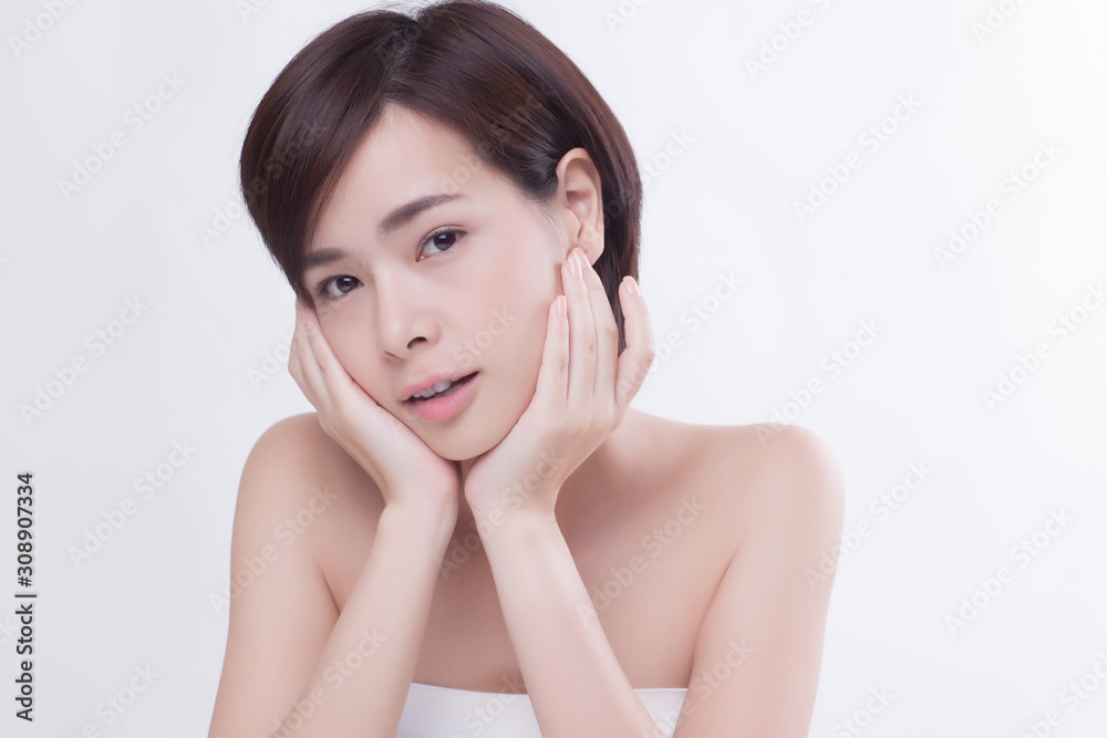 Young beautiful Asian female model on the white background Young beautiful Asian female model on the white background