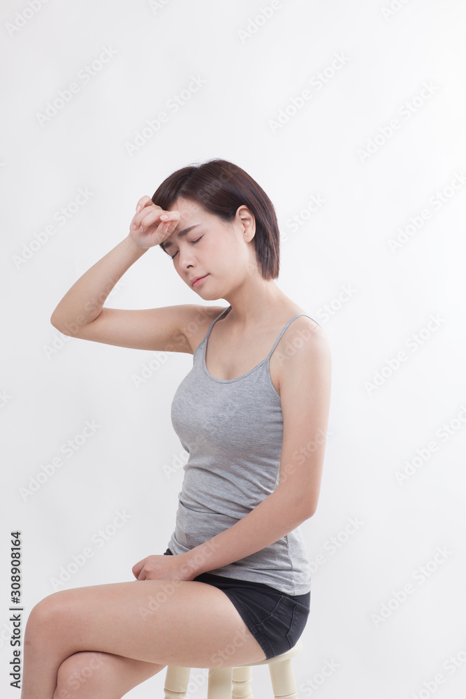 Young beautiful Asian female model on the white background Young beautiful Asian female model on the white background