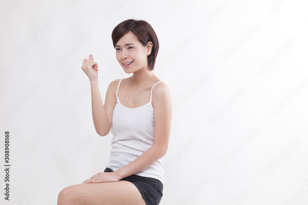 Young beautiful Asian short hair female model on white background Young beautiful Asian short hair female model on white background