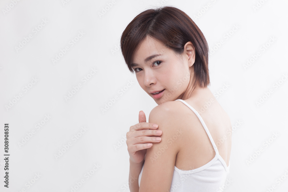 Young beautiful Asian short hair female model on white background Young beautiful Asian short hair female model on white background