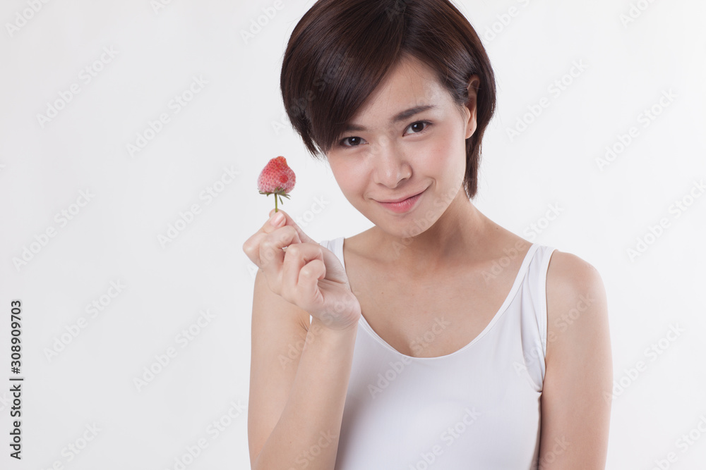 Young beautiful Asian female model on the white background for business concept Young beautiful Asian female model on the white background for business concept