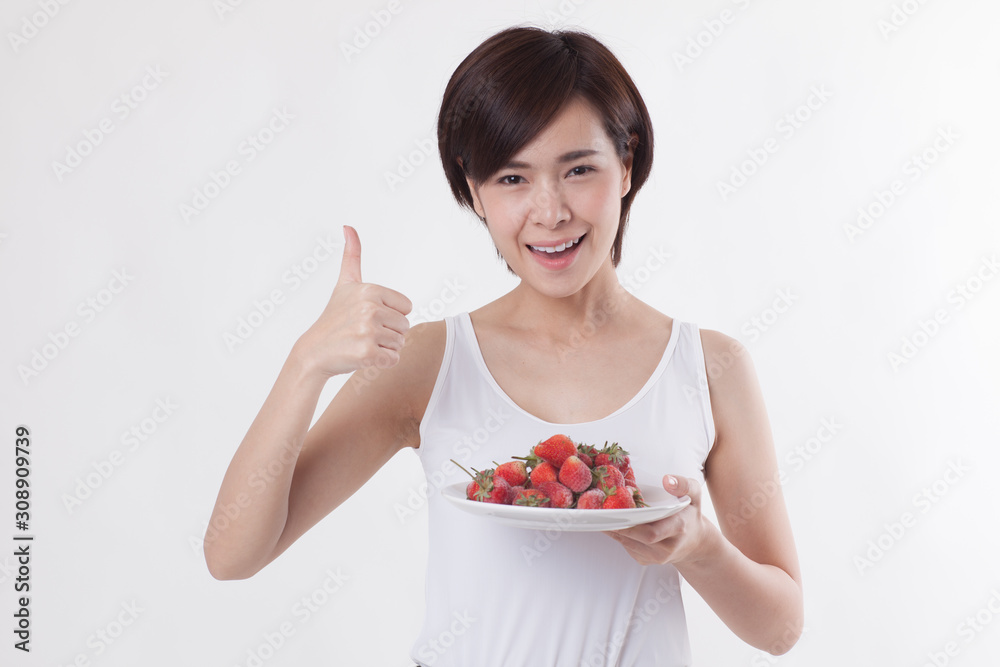 Young beautiful Asian female model on the white background for business concept Young beautiful Asian female model on the white background for business concept