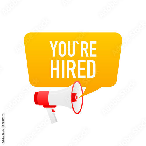 Male hand holding megaphone with you're hired speech bubble. Loudspeaker.