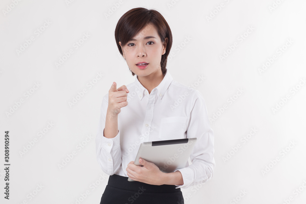 Young beautiful Asian female model on the white background for business concept Young beautiful Asian female model on the white background for business concept