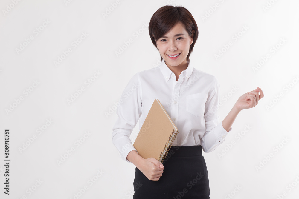 Young beautiful Asian female model on the white background for business concept Young beautiful Asian female model on the white background for business concept