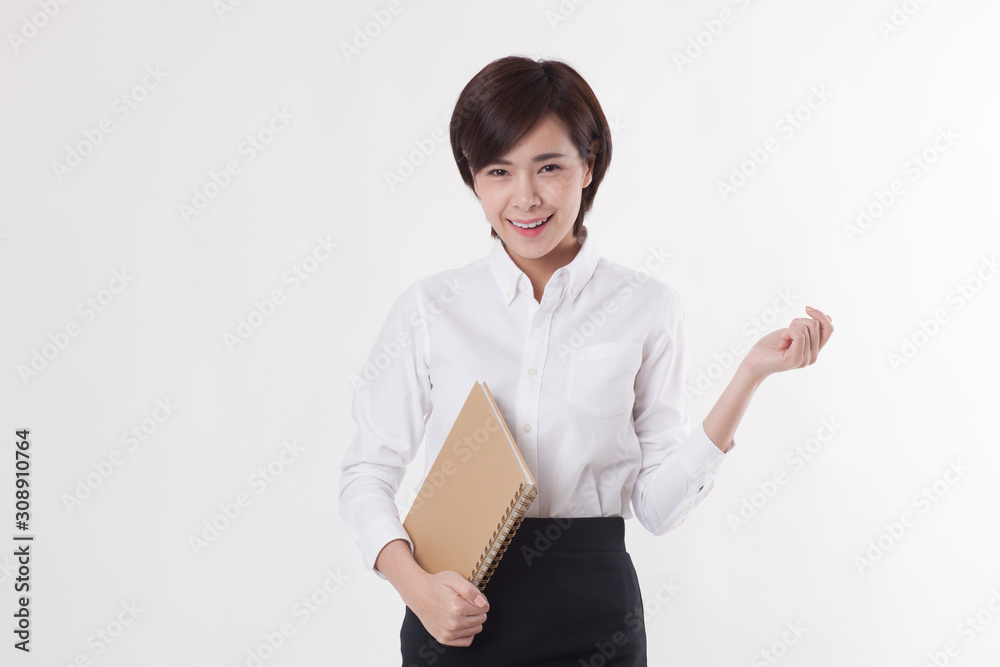 Young beautiful Asian female model on the white background for business concept Young beautiful Asian female model on the white background for business concept