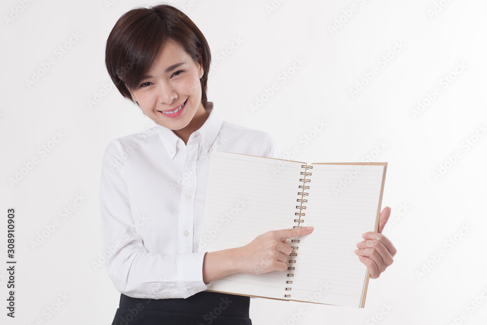 Young beautiful Asian female model on the white background for business concept Young beautiful Asian female model on the white background for business concept