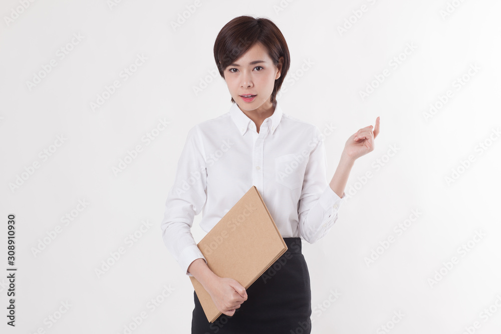 Young beautiful Asian female model on the white background for business concept Young beautiful Asian female model on the white background for business concept