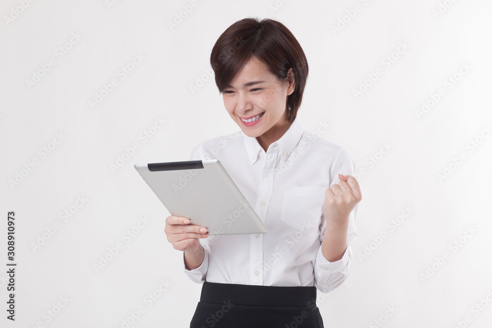Young beautiful Asian female model on the white background for business concept Young beautiful Asian female model on the white background for business concept