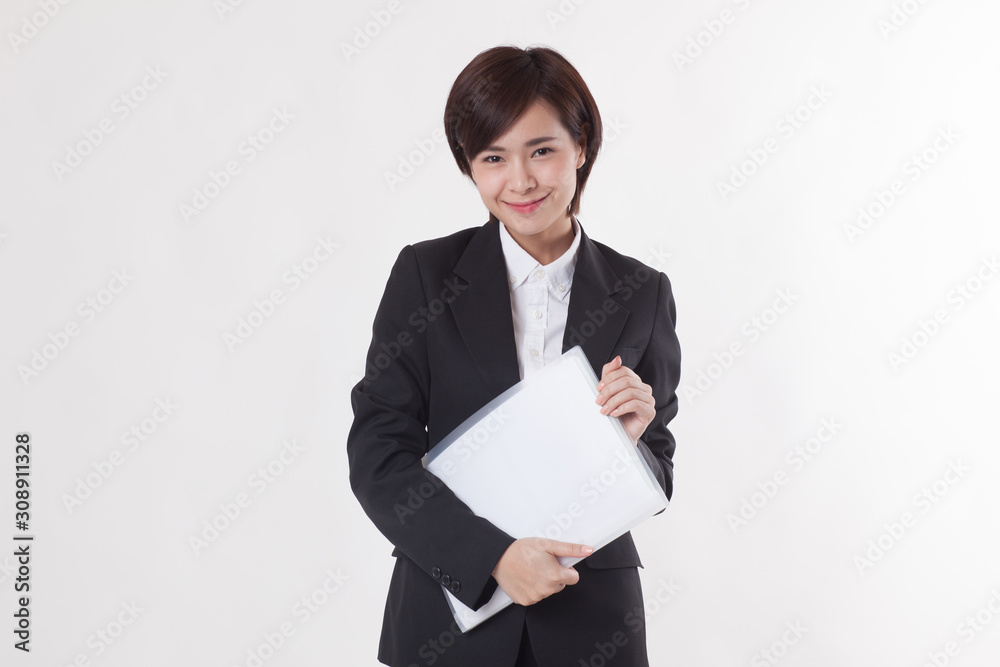 Young Asian short hair female model in formal dress which is good for business purpose Young Asian short hair female model in formal dress which is good for business purpose