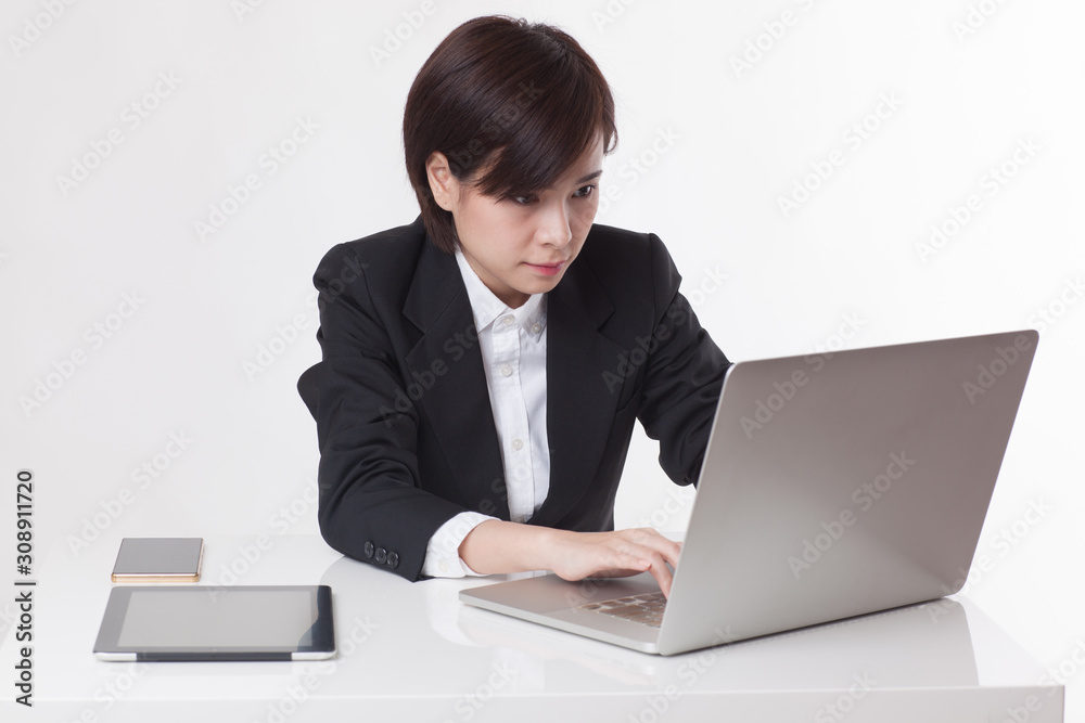 Young Asian short hair female model in formal dress which is good for business purpose Young Asian short hair female model in formal dress which is good for business purpose