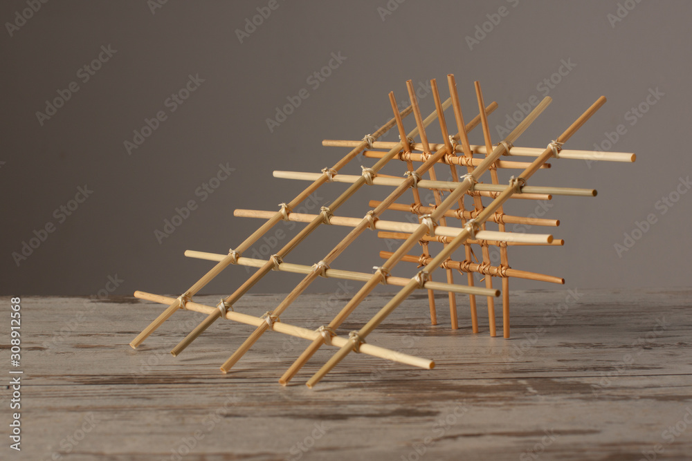 Straw sculptures on a gray background. Decoration. Souvenir Straw sculptures on a gray background. Decoration. Souvenir