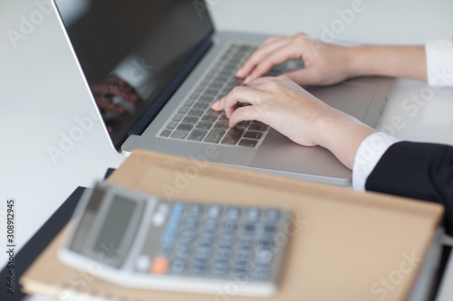 beautiful hands on a laptop keyboard