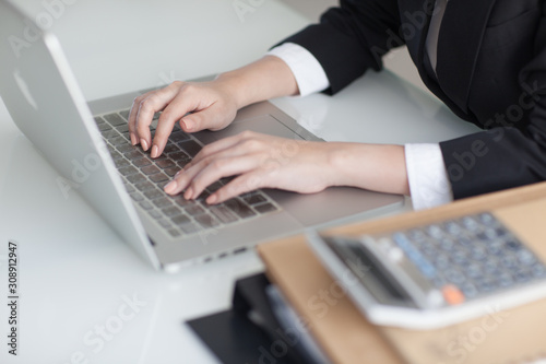 beautiful hands on a laptop keyboard