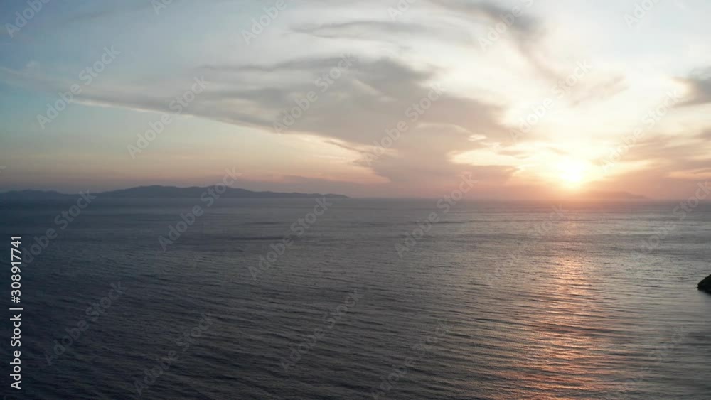 Aerial drone view of beautiful sunset in Greece with view over the Aegean sea Aerial drone view of beautiful sunset in Greece with view over the Aegean sea
