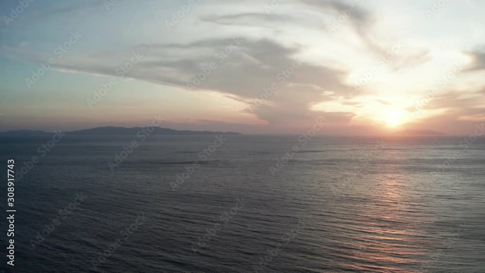 Aerial drone view of beautiful sunset in Greece with view over the Aegean Sea Aerial drone view of beautiful sunset in Greece with view over the Aegean Sea
