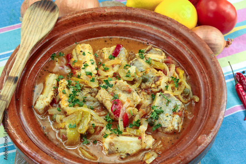 rougail of fish on a table photo