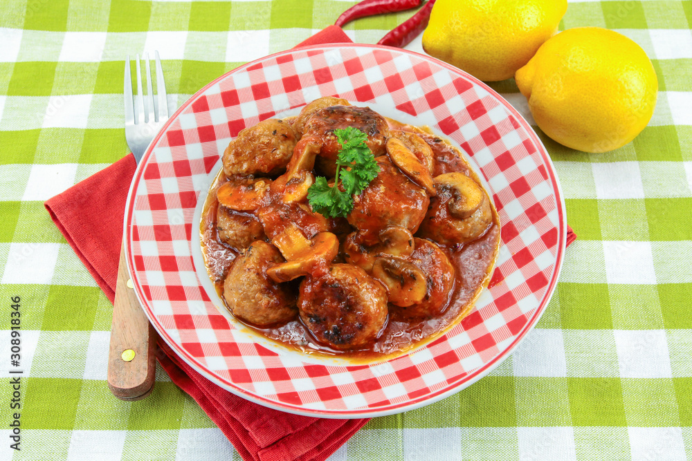 meatballs with tomato sauce on a plate meatballs with tomato sauce on a plate