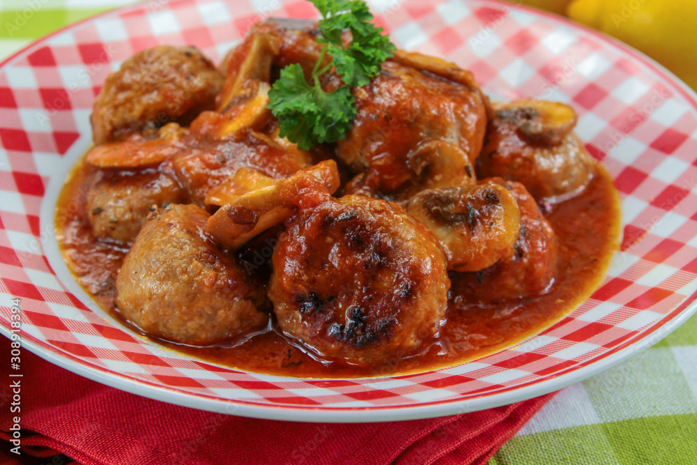 meatballs with tomato sauce on a plate meatballs with tomato sauce on a plate