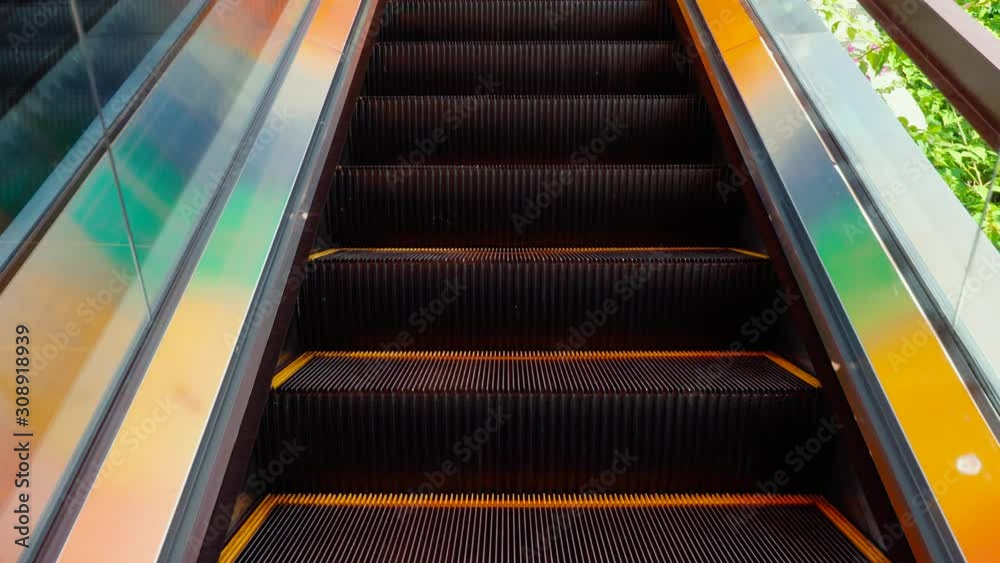 Steps moving escalator. Close-up. Steps moving escalator. Close-up.