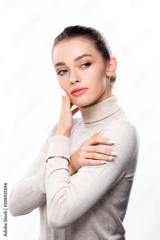beautiful girl with natural makeup touching face and looking away isolated on white beautiful girl with natural makeup touching face and looking away isolated on white