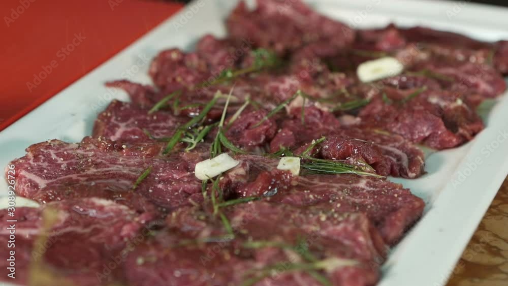 dressing veal meat with spices before cooking dressing veal meat with spices before cooking