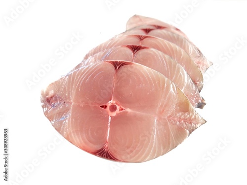 slices of fish on white blackground.