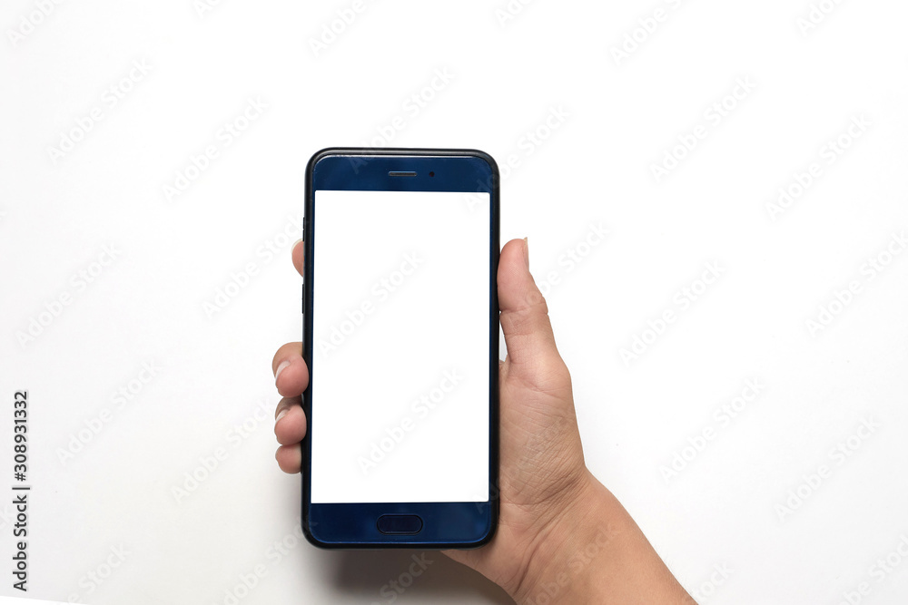 woman holds smartphone in her left hand on white background with copyspace