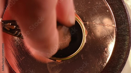 wax melt and stamp pour from wax, close up from above, soft focus