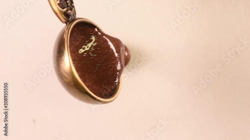 wax melt and stamp pour from wax, close up from above, soft focus