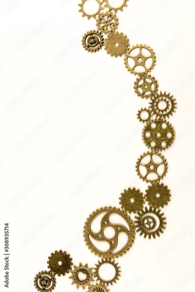 metallic gears background / Closeup of metal cog gears / close up texture pattern steampunk style and old mechanical peaces / decorative frame metallic gears background / Closeup of metal cog gears / close up texture pattern steampunk style and old mechanical peaces / decorative frame
