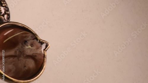 wax melt and stamp pour from wax, close up from above, soft focus