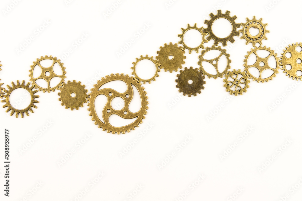 metallic gears background / Closeup of metal cog gears / close up texture pattern steampunk style and old mechanical peaces / decorative frame metallic gears background / Closeup of metal cog gears / close up texture pattern steampunk style and old mechanical peaces / decorative frame