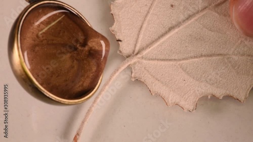wax melt and stamp pour from wax, close up from above, soft focus