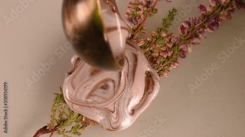 wax melt and stamp pour from wax, close up from above, soft focus