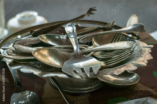 A tray of old cutlery are shown on a local market  in Rio De Janeiro.