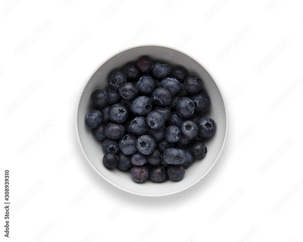 A white bowl full of delicious fresh Blueberries, isolated on white A white bowl full of delicious fresh Blueberries, isolated on white