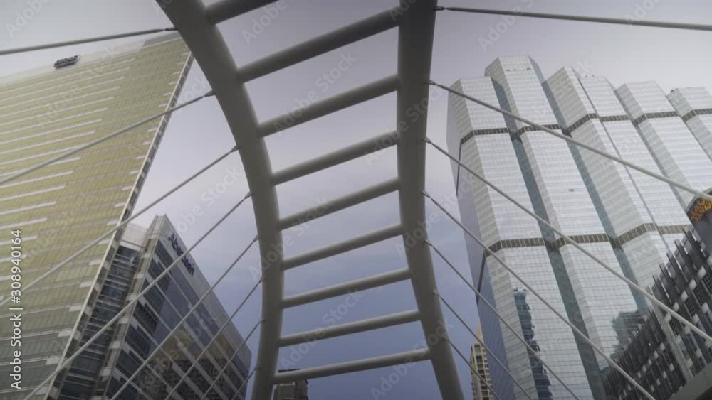 Chong Nonsi Skywalk At Sathorn Road, Business Center Of Bangkok, Thailand - Stunning Scenery Of High Rise Towers Under The Cloudy Sky - Panoramic Shot Chong Nonsi Skywalk At Sathorn Road, Business Center Of Bangkok, Thailand - Stunning Scenery Of High Rise Towers Under The Cloudy Sky - Panoramic Shot