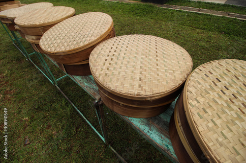 Tenong is a circular tool made of woven hemispheres of split bamboo trees