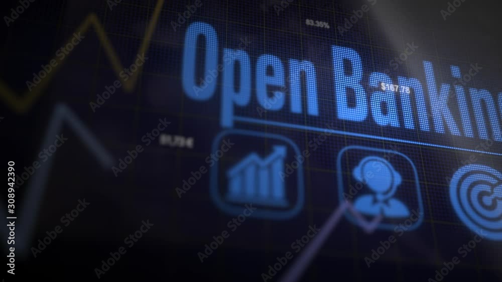 Open Banking business concept on a flashing computer monitor with moving graphs and data.