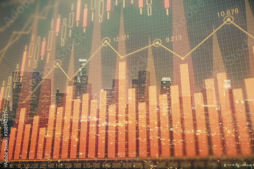 Multi exposure of forex chart drawings over cityscape background. Concept of success.