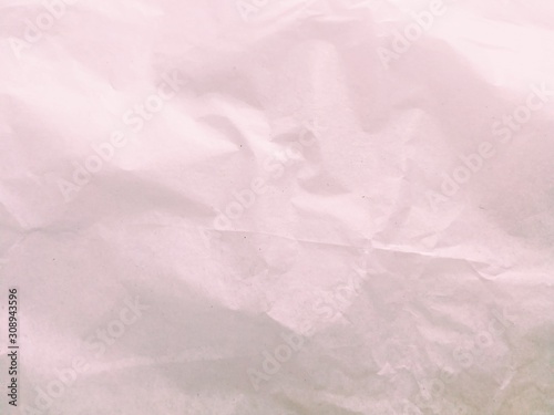 Full frame shot of crumpled light pink paper