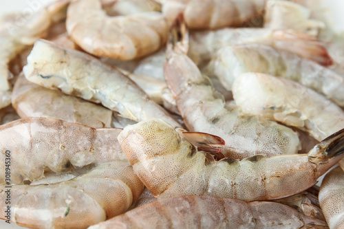 Fresh raw shrimps as background, closeup view