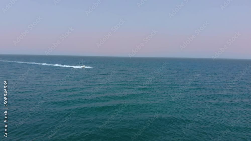 Motor boat driving across open ocean
Australia Motor boat driving across open ocean
Australia
