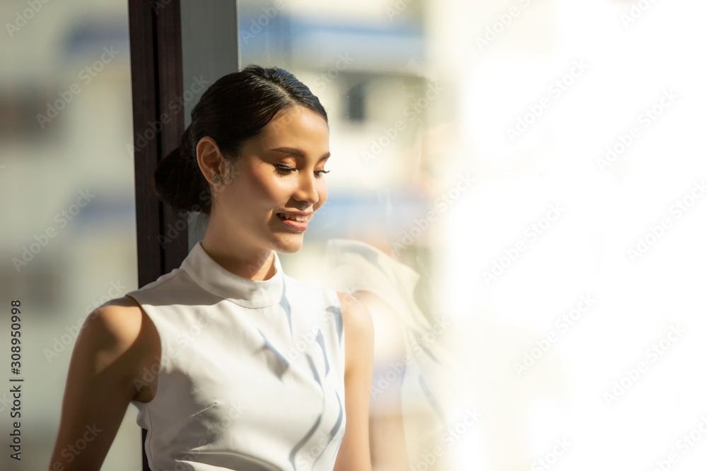 Head shot of confident business women or female team leader in office. Head shot of confident business women or female team leader in office.