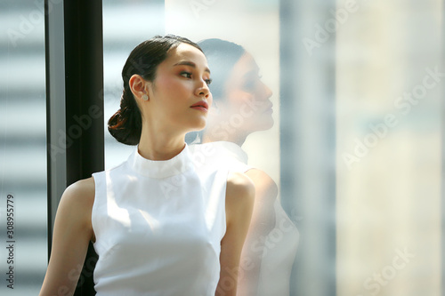 Free Download Head shot of confident business women or female team leader in office. - GFXLoad
